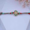 Charming Floral Red & Green Designer Rakhi for Brother