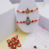 Divine Rakhi Combo - One Rakhi having Om and Damru | Another Rakhi with Om Namah Shivay Script and Trishul