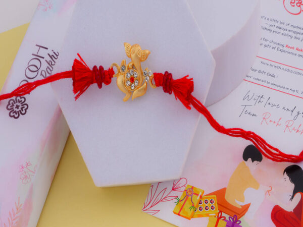 Lord Ganesha Rakhi - Stone Studded with Red Threads