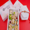 Red beautiful Rakhi with Sweets Online in India