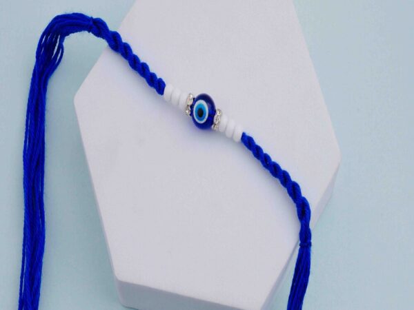 Bold Evil Eye Rakhi in Deep Blue and White Beads