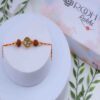 Om & Rudraksha Rakhi Online with Mauli Thread