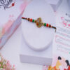 Om Beaded Rakhi for Brother Online