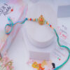 Ganesha Beaded Rakhi Online