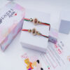 Om Swastik Rakhi Set of 2